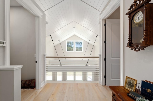 bonus room with wooden ceiling, wood finished floors, and vaulted ceiling