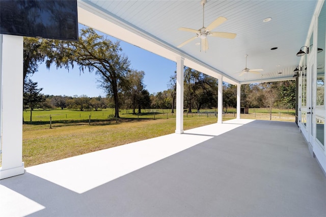 view of patio featuring a ceiling fan