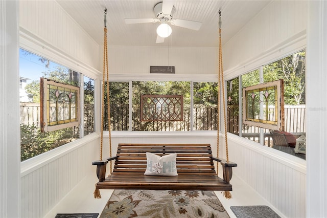 sunroom / solarium with ceiling fan