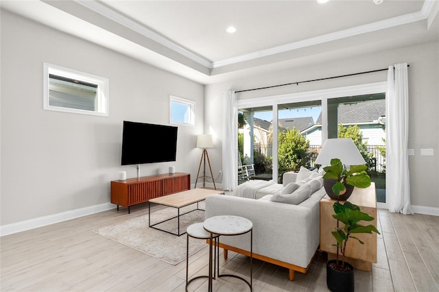 living room with recessed lighting, baseboards, light wood finished floors, and ornamental molding