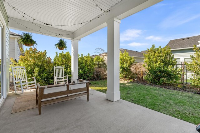 view of patio with fence