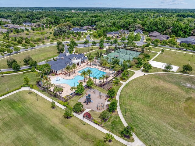 aerial view featuring a wooded view