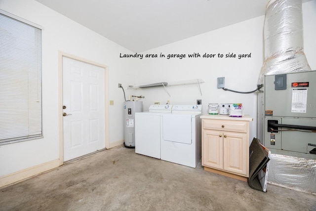 clothes washing area with baseboards, cabinet space, water heater, and washer and clothes dryer