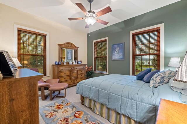 bedroom featuring carpet flooring and ceiling fan