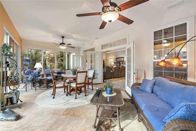 sunroom with french doors and visible vents