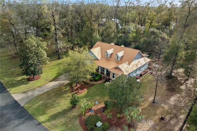 drone / aerial view with a view of trees