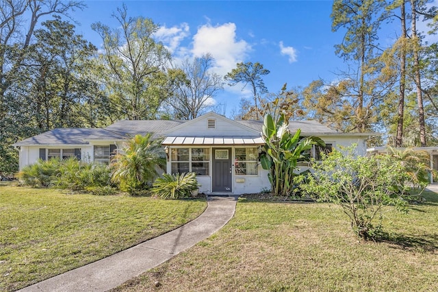 view of front of house with a front yard