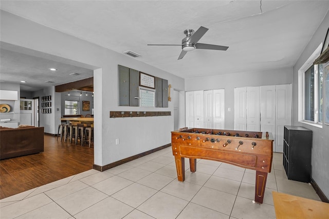 playroom featuring visible vents, plenty of natural light, and light tile patterned flooring