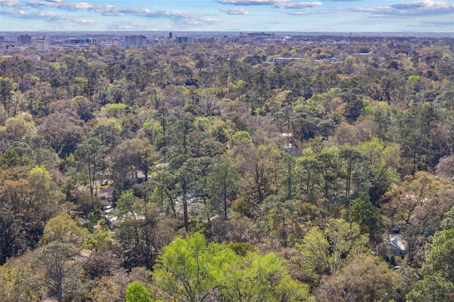 aerial view featuring a view of trees