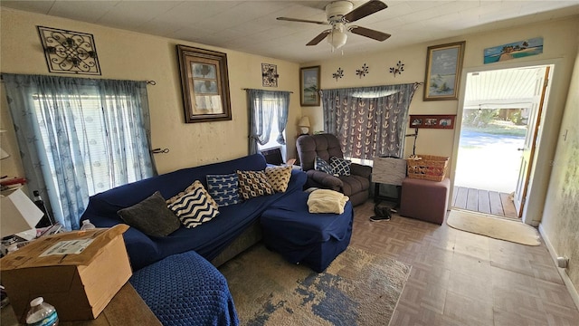 living area featuring ceiling fan