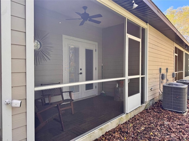 property entrance featuring central AC and ceiling fan