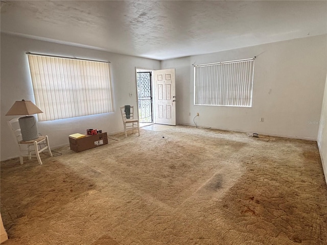 interior space featuring a textured ceiling