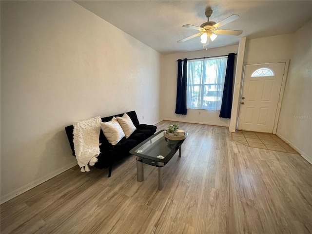 unfurnished room featuring light wood-style flooring and baseboards