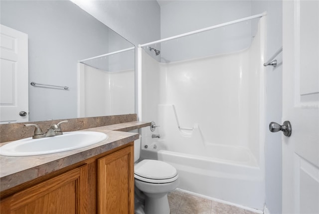 bathroom featuring tile patterned floors, toilet, tub / shower combination, and vanity