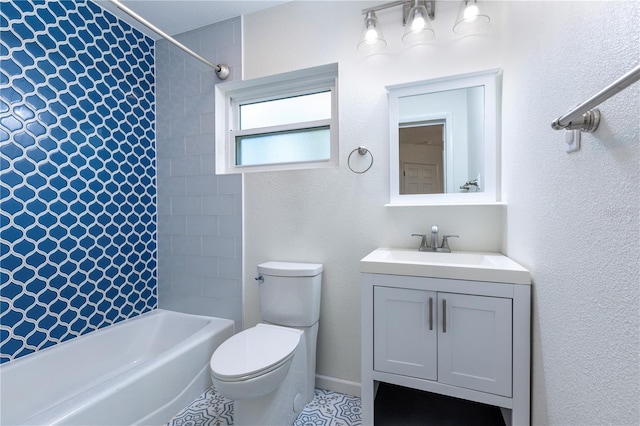 bathroom featuring vanity, toilet, and shower / bath combination