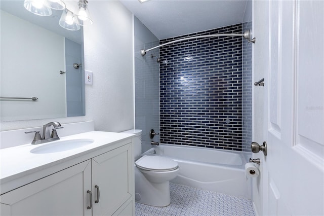 full bathroom with tile patterned flooring, toilet, tub / shower combination, and vanity