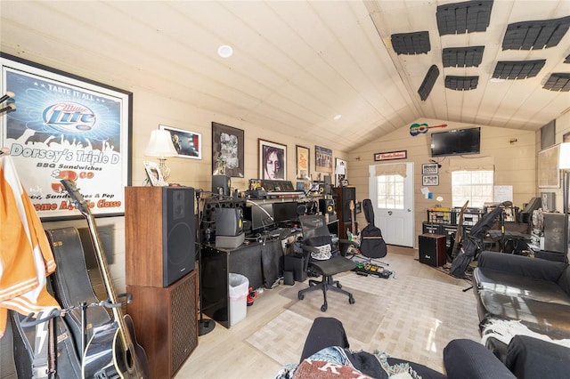 home office with lofted ceiling