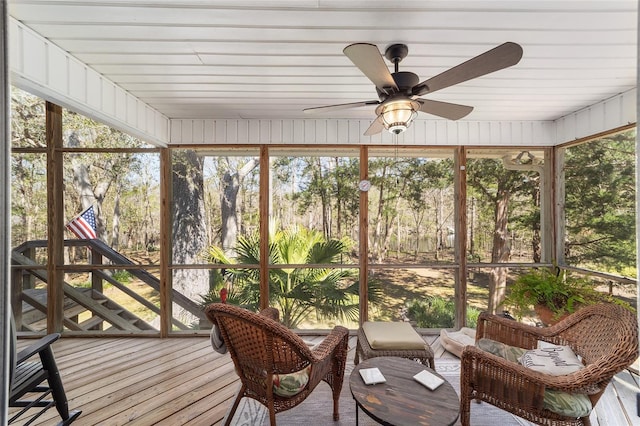 sunroom / solarium with ceiling fan