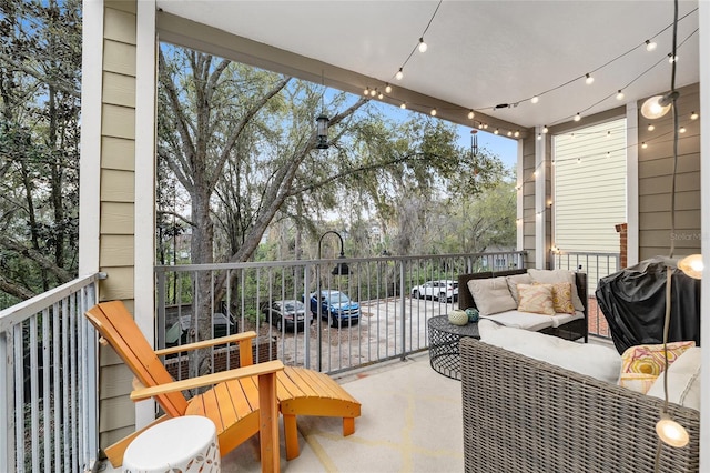 exterior space featuring an outdoor hangout area, a balcony, and area for grilling