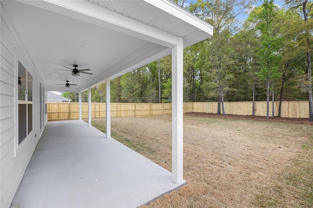 view of patio featuring a fenced backyard and a ceiling fan