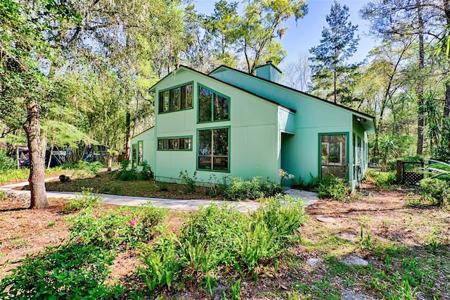 view of front of property with a chimney