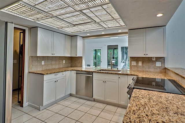 kitchen featuring light tile patterned floors, a sink, white cabinets, dishwasher, and black electric range oven