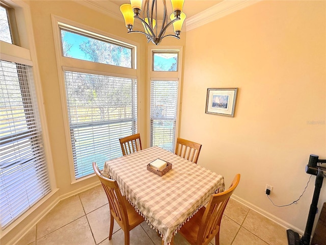 dining space with crown molding, a notable chandelier, baseboards, and light tile patterned floors