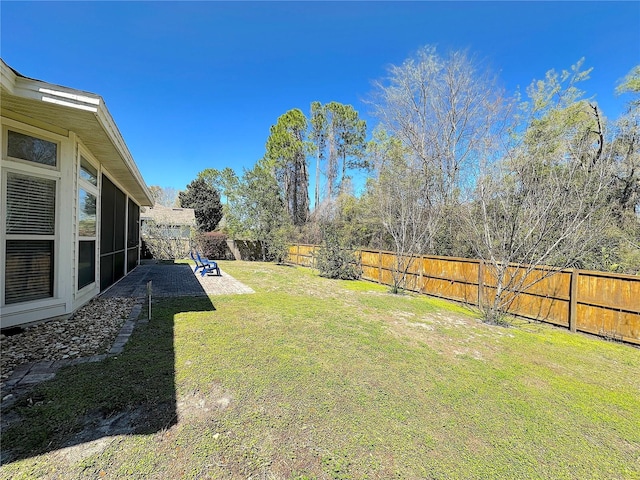 view of yard featuring a patio and a fenced backyard