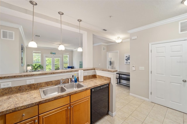 kitchen featuring brown cabinetry, visible vents, a sink, pendant lighting, and dishwasher