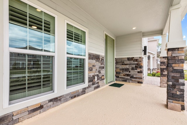 view of patio featuring a porch