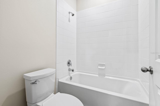 bathroom with toilet and shower / bathtub combination