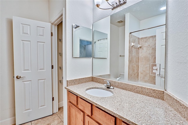 full bath featuring visible vents, toilet, tile patterned flooring, a shower, and vanity