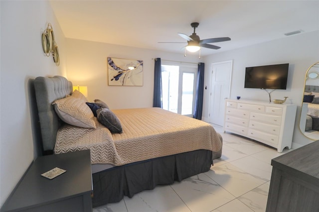 bedroom featuring visible vents, marble finish floor, and ceiling fan