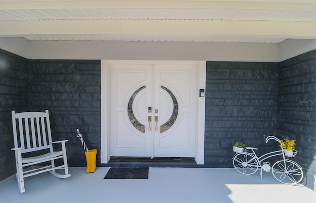 817 Blue Heron Blvd, Ruskin, FL 33570 - property entrance with a porch