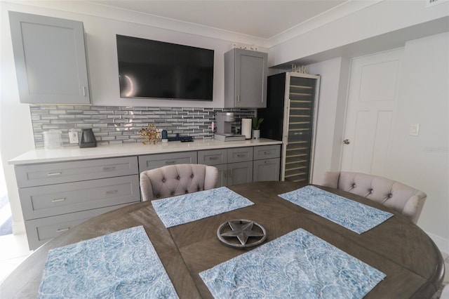 817 Blue Heron Blvd, Ruskin, FL 33570 - dining room featuring crown molding