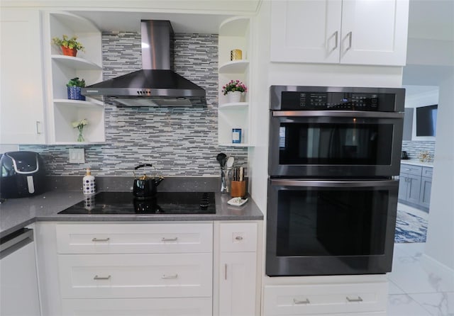 817 Blue Heron Blvd, Ruskin, FL 33570 - kitchen with open shelves, wall chimney range hood, stainless steel double oven, and white cabinets