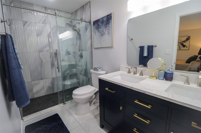 817 Blue Heron Blvd, Ruskin, FL 33570 - bathroom with toilet, connected bathroom, double vanity, a shower stall, and tile patterned flooring