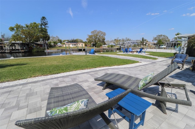 817 Blue Heron Blvd, Ruskin, FL 33570 - view of patio featuring a water view