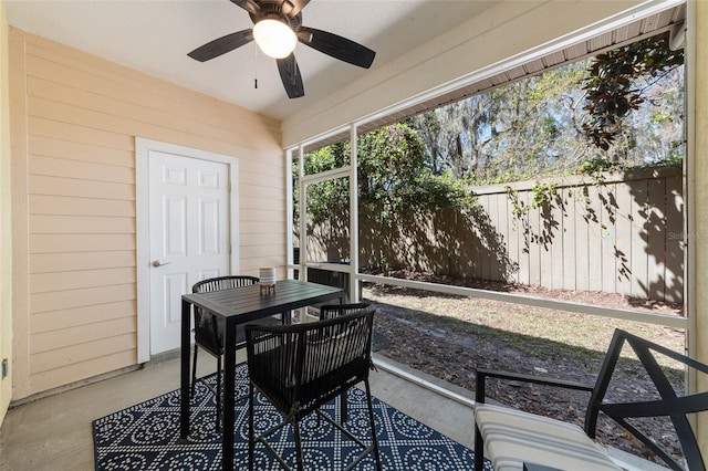 sunroom / solarium with ceiling fan