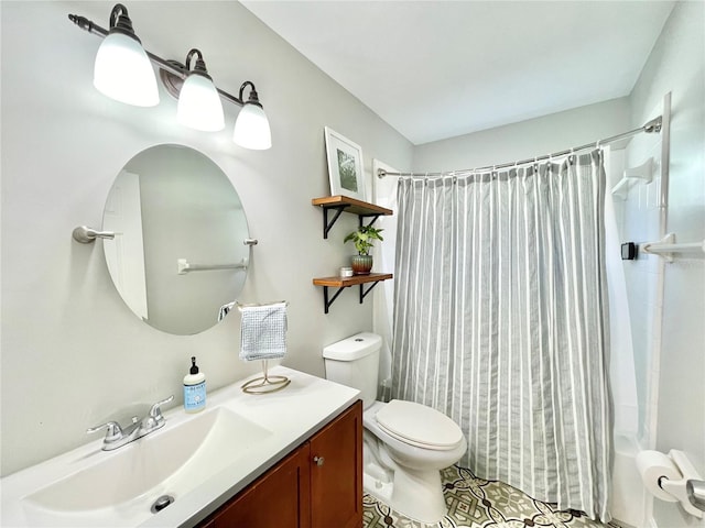 bathroom with toilet and vanity