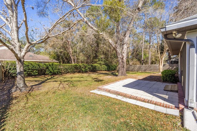 view of yard with a patio area and fence