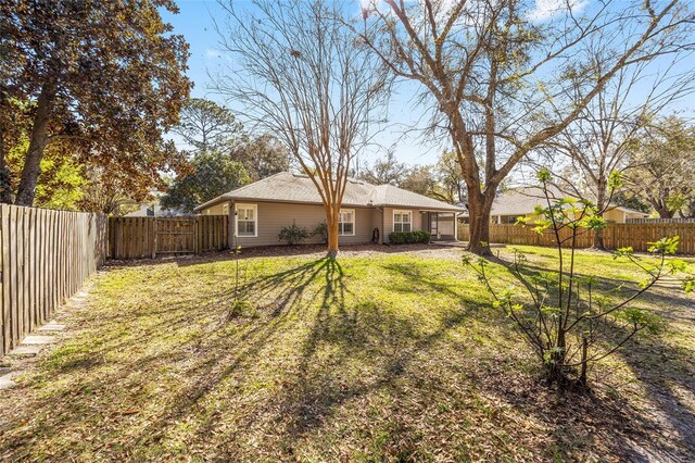 view of yard featuring a fenced backyard