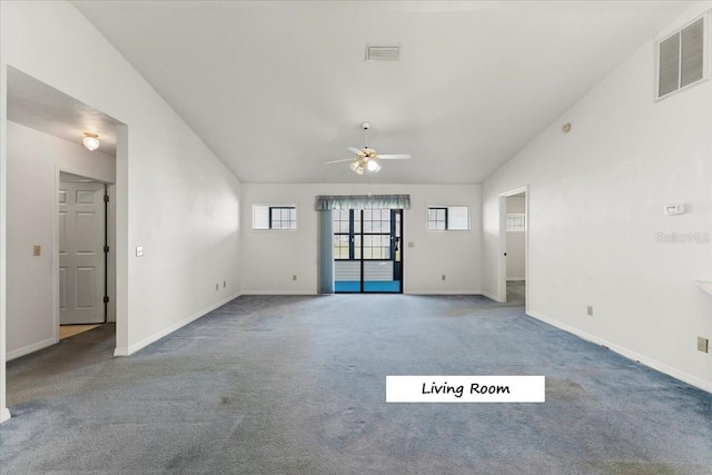 unfurnished living room with visible vents, lofted ceiling, carpet, and baseboards