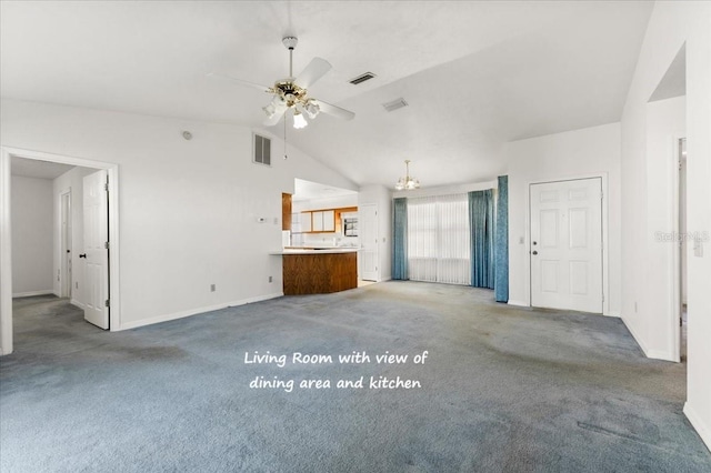 unfurnished living room featuring visible vents, lofted ceiling, ceiling fan, and carpet floors