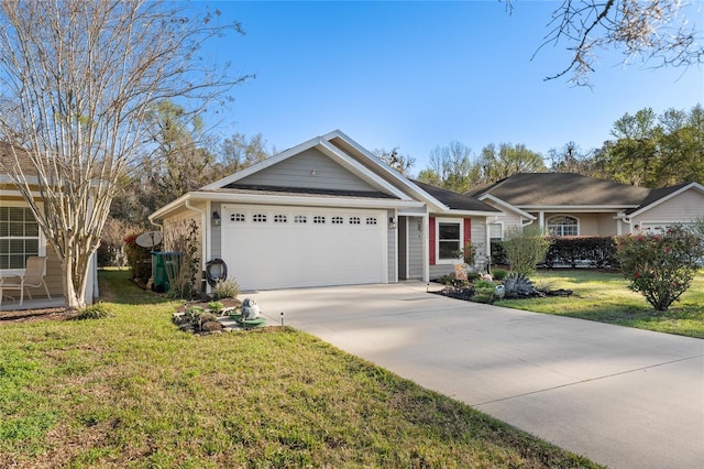 ranch-style home featuring an attached garage, driveway, and a front yard