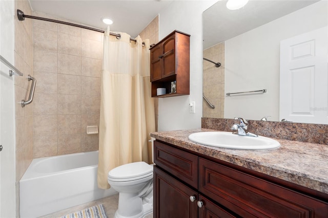 bathroom featuring toilet, shower / tub combo with curtain, and vanity