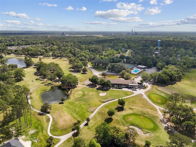 aerial view featuring golf course view and a water view