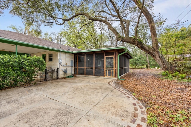 exterior space with a sunroom