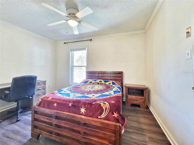 bedroom featuring crown molding, wood finished floors, baseboards, and a textured ceiling