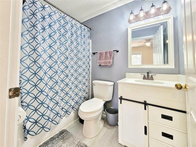 bathroom with crown molding, toilet, a textured ceiling, vanity, and shower / bathtub combination with curtain